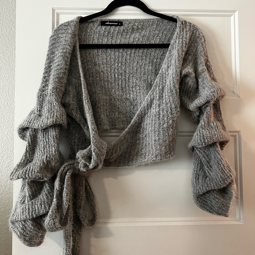 Cropped tie around sweater